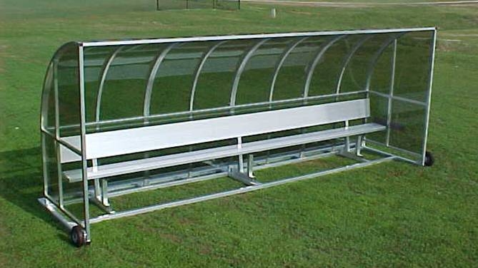 European-style team shelter with curved roof design and tinted panels